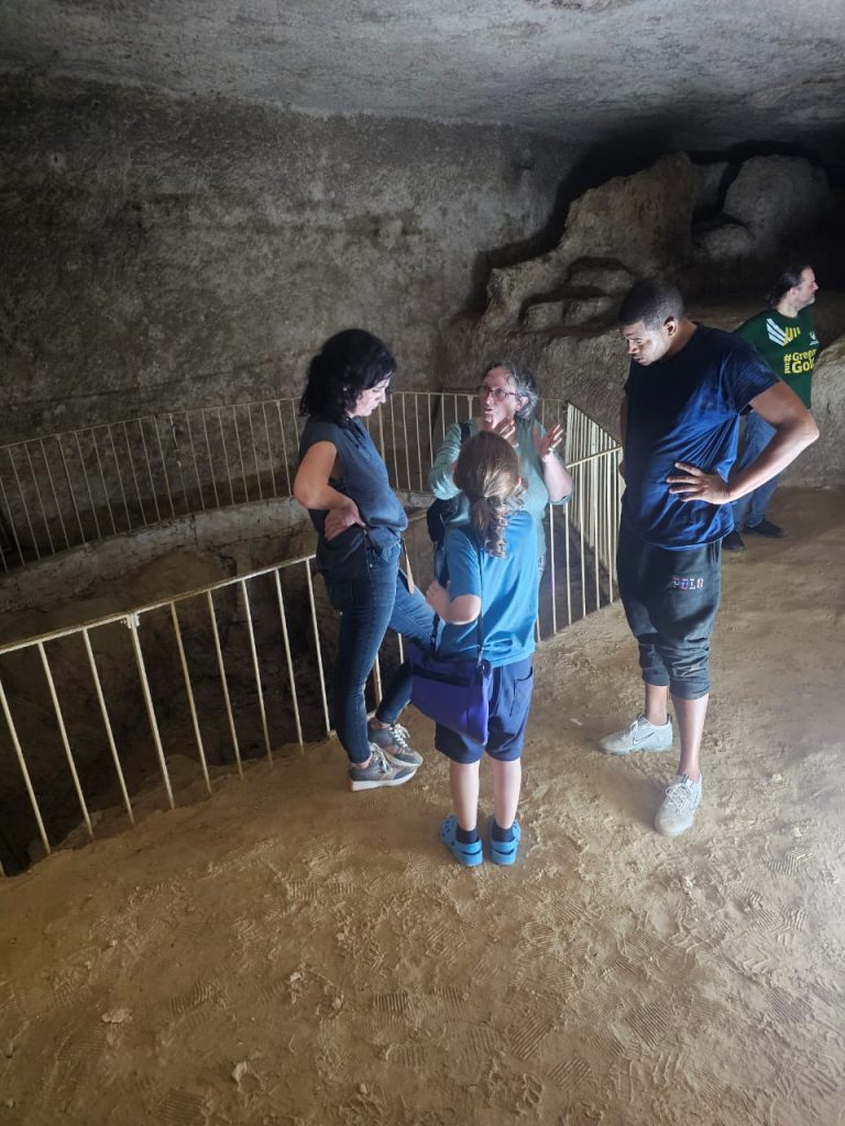 Mara guiding her grandson and guests during a private visit inside the Pit of the Great Pyramid of Giza