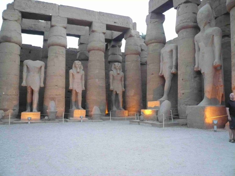 Two rows of colossal statues of Ramses II at Luxor Temple, Egypt