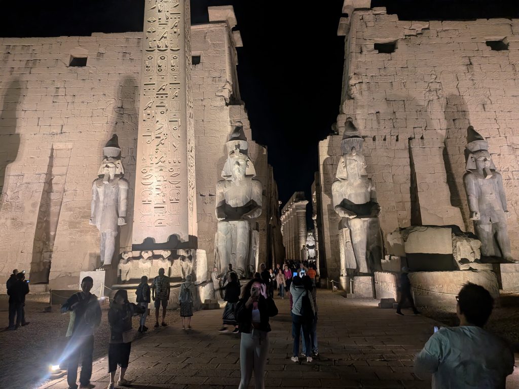 Luxor Temple at night beautifully illuminated against a dark sky is a centerpiece of our 7 day Egyptian itinerary