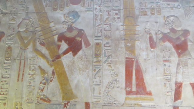 This is why we make the journey to the temple's rear. The finest preserved "Raising of the Djed" in Egypt. To stand before it is to feel the ancient promise of stability, resurrection, and the eternal renewal of life—the very heart of the Egyptian mystery. Pharaoh Seti I ceremonially raising the Djed pillar in a relief at Abydos Temple, symbolizing stability and resurrection.