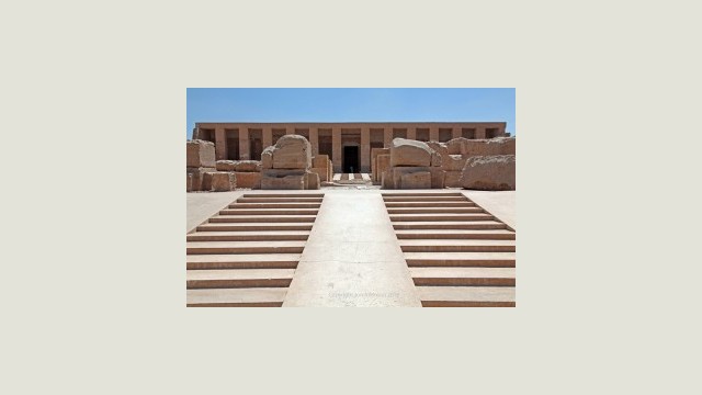 The climb up to the Sety I temple is a ritual in itself. Each step draws you closer to the sanctuary above, building a quiet anticipation for what lies within. View ascending the twin stairways towards the Temple of Seti I at Abydos, Egypt.